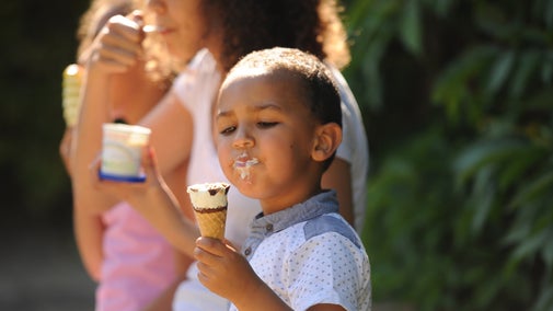 Children eating ice cream in the garden at Rufford Old Hall, Lancashire